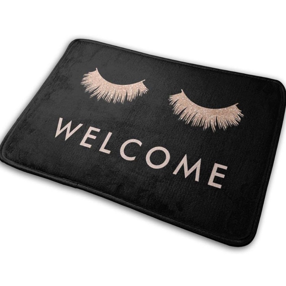 Black Welcome Mat with Eyelash Design